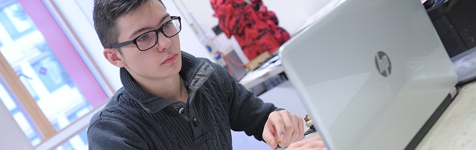 student using laptop